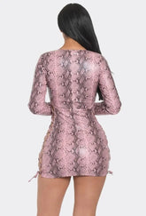Image & Stylez LLCSnake Print DressAll Lace-Up Snake Print DressShow off your edgy side with this stunning Faux Leather Snake Print Lace-Up Dress. Made from premium quality faux leather material, this dress is designed to last anbodycon dresses